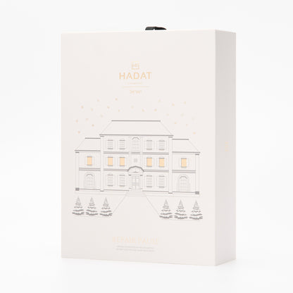 Hadat Cosmetics Repair Pause hair treatment box with mansion illustration