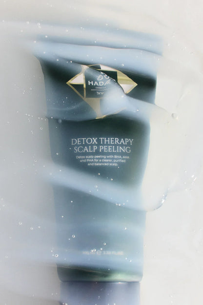 Detox Therapy Scalp Peeling behind a translucent water veil