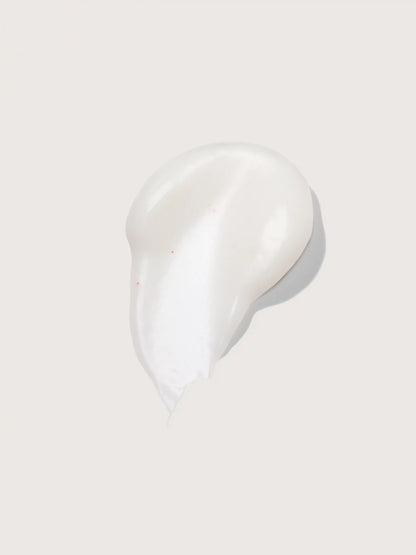 Smooth white cream with subtle red specks