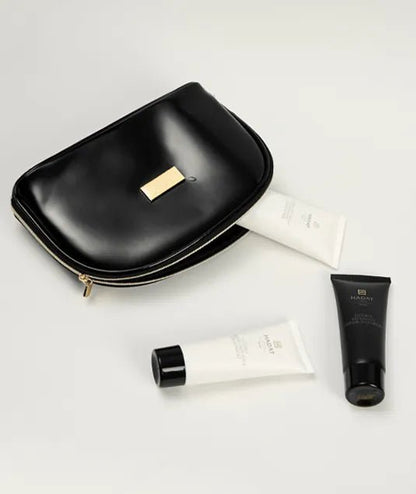 Black cosmetic bag with skincare tubes, Sea Oil Silk products