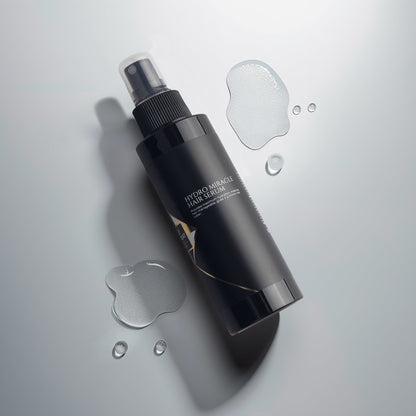 Hydro Miracle Hair Serum bottle with serum droplets