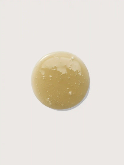 Golden nourishing oil with bubbles, sea minerals