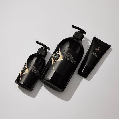 Black Hydro Nourishing Moisture Shampoo bottles with gold accents on white background