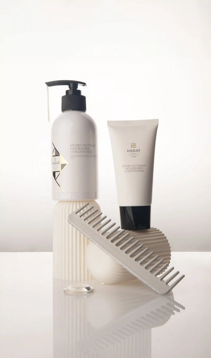 Hydro Nutrient Nourishing Conditioner bottles with comb