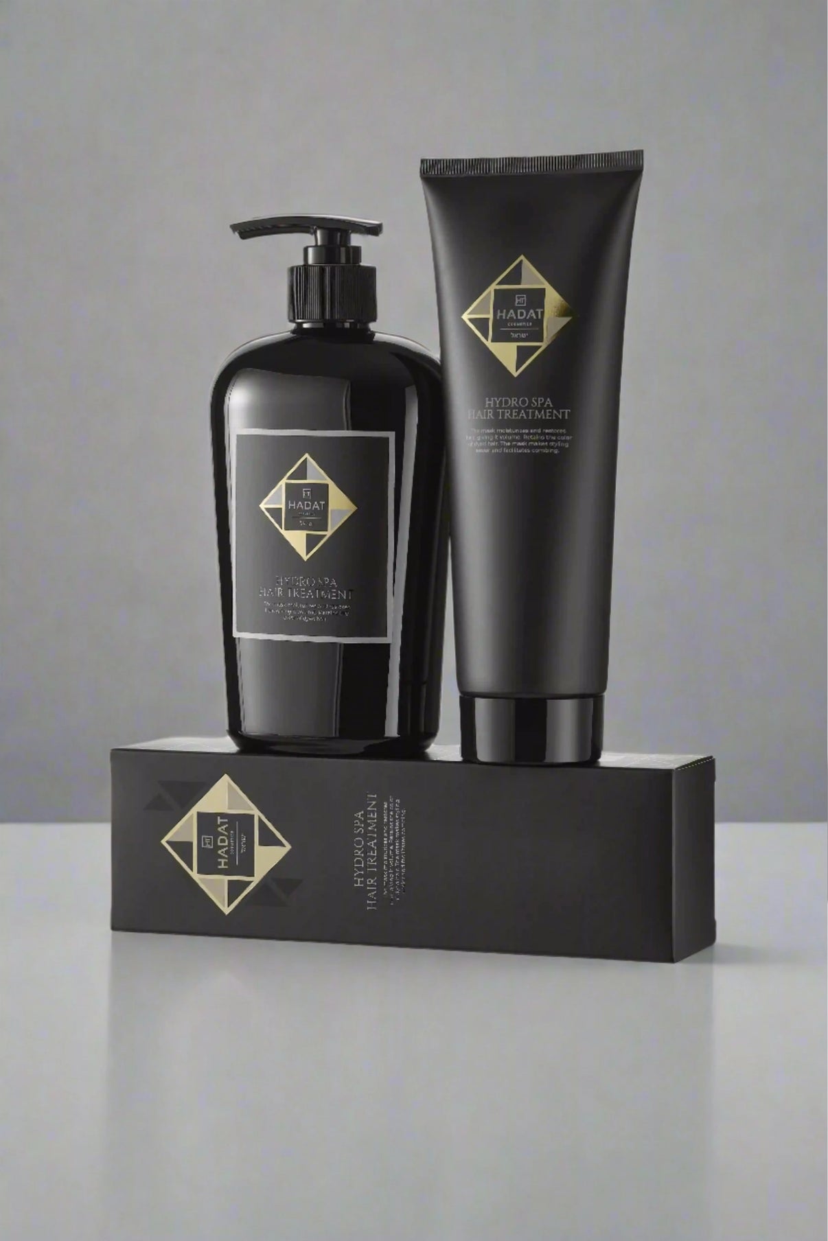 Hydro Spa Hair Treatment set with sleek black bottles and box