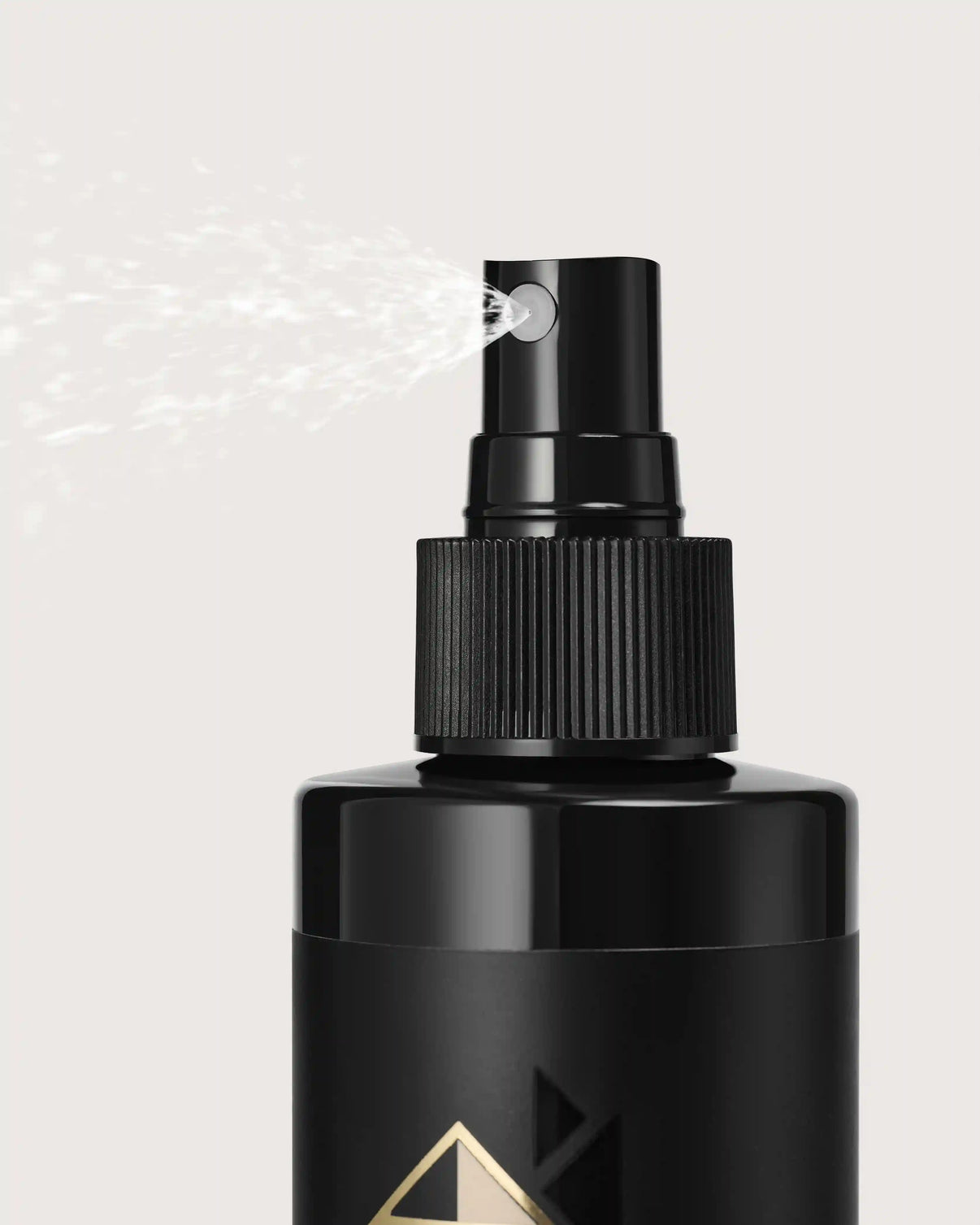 Black spray bottle misting fine hair mist