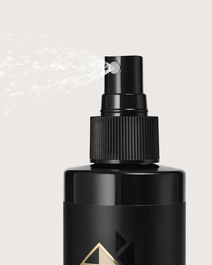 Black spray bottle misting fine hair mist