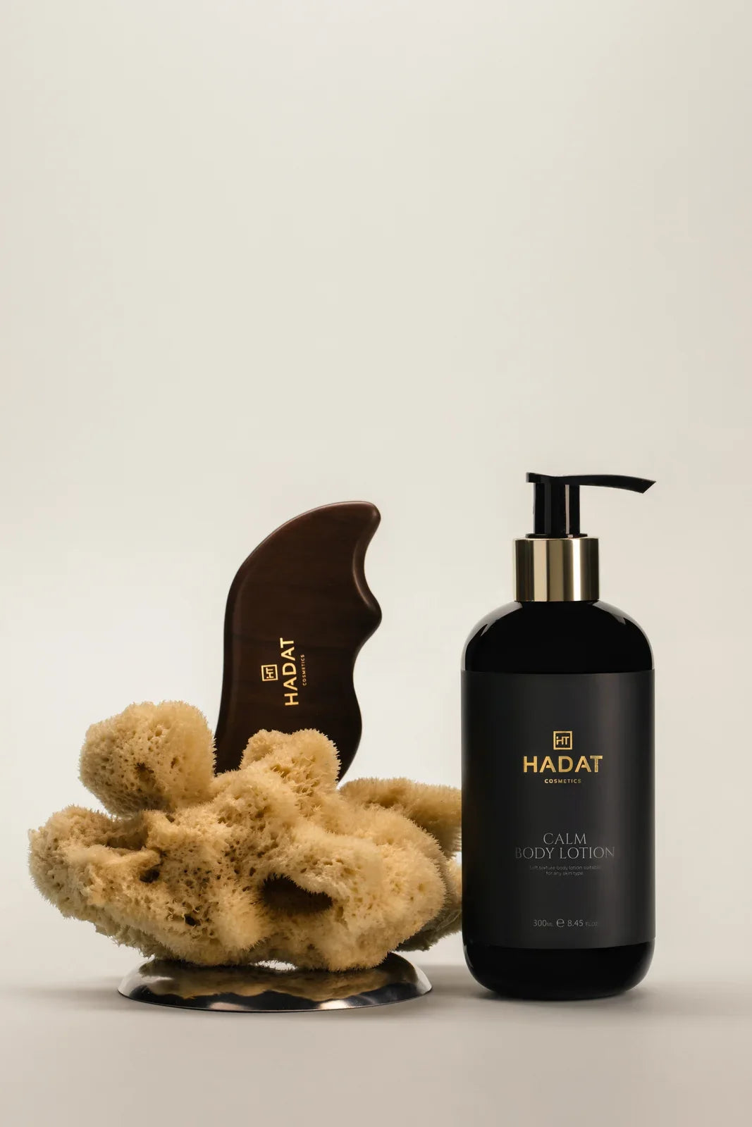 Hadat Calm Body Lotion with body-care accessories